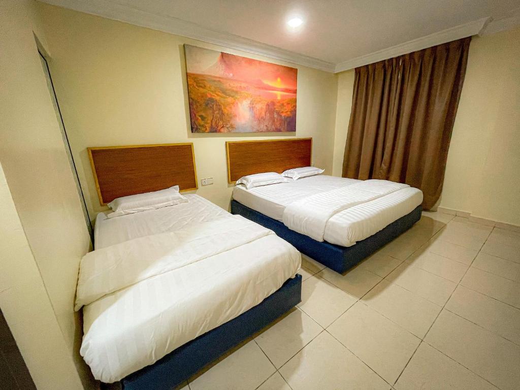 Postel nebo postele na pokoji v ubytování The Hotel