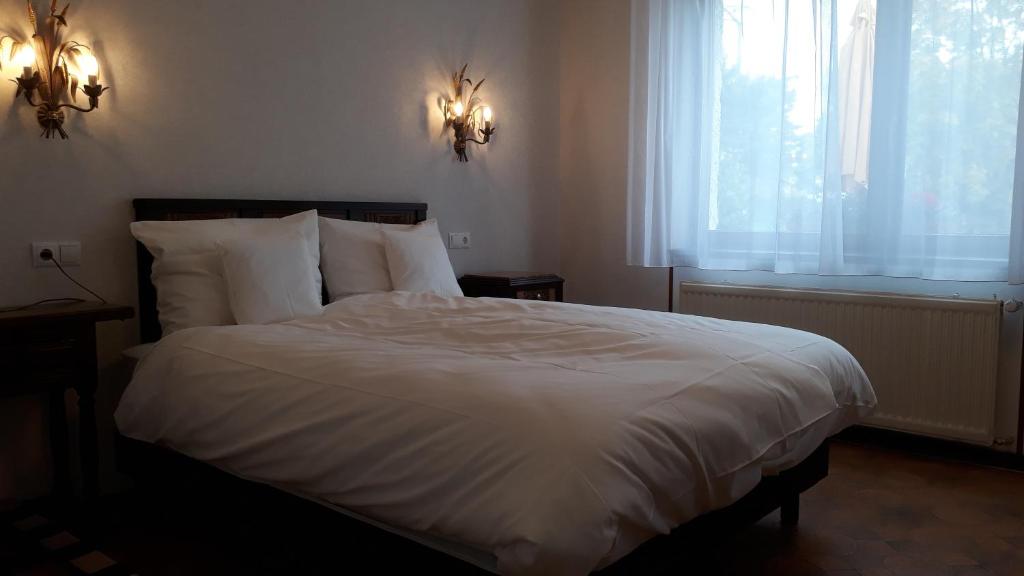 Postel nebo postele na pokoji v ubytování Villa Franzen