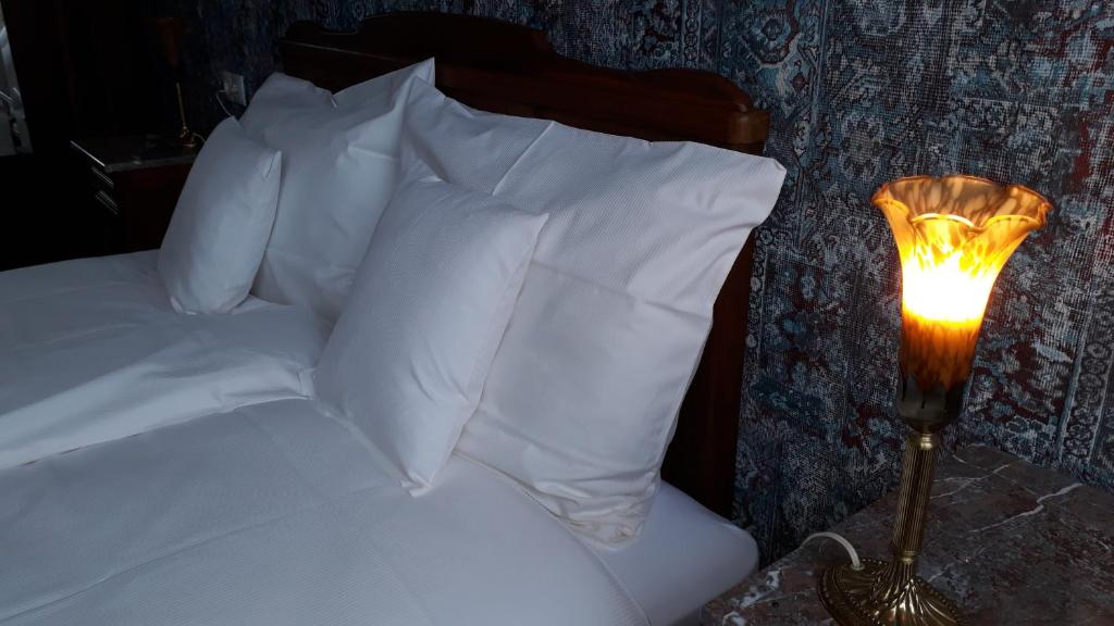 Postel nebo postele na pokoji v ubytování Villa Franzen