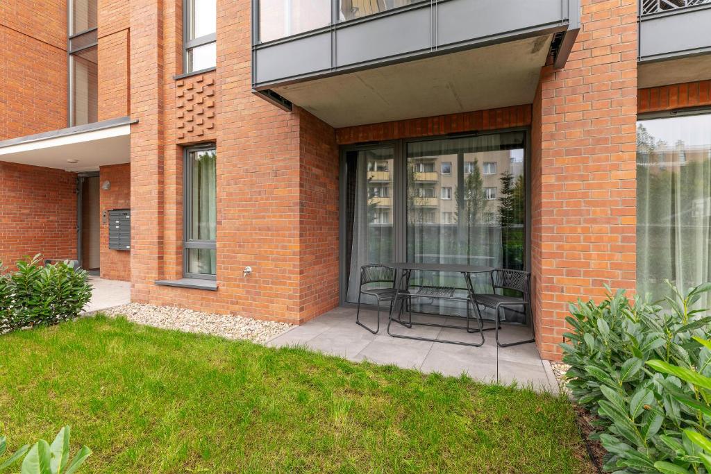 Vonkajšia záhrada v ubytovaní SCALA City Center by Downtown Apartments