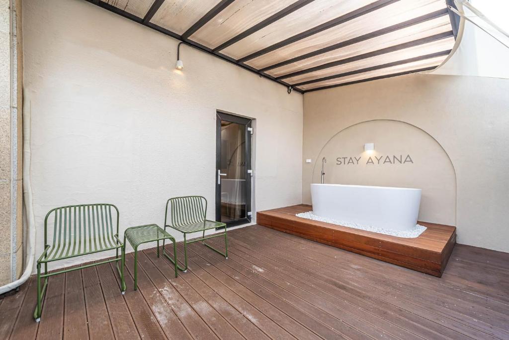 Postel nebo postele na pokoji v ubytování HOTEL STAY AYANA DAEJEON