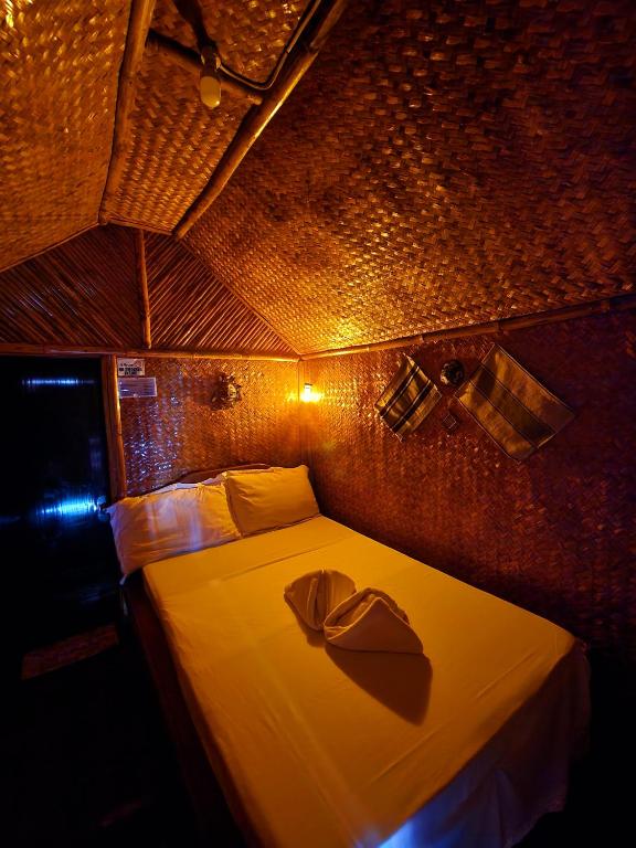 Postel nebo postele na pokoji v ubytování Uno Dus Tourist Inn