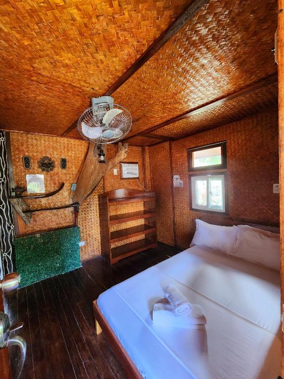 Postel nebo postele na pokoji v ubytování Uno Dus Tourist Inn