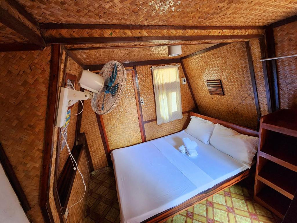 Postel nebo postele na pokoji v ubytování Uno Dus Tourist Inn