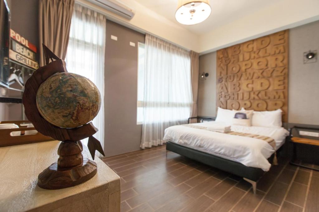 Postel nebo postele na pokoji v ubytování Angel Inn