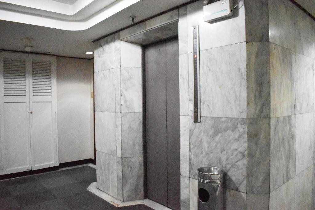 Koupelna v ubytování Sunette Tower Suites Makati