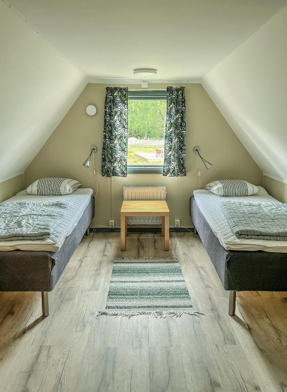 Postel nebo postele na pokoji v ubytování Sudersand Resort