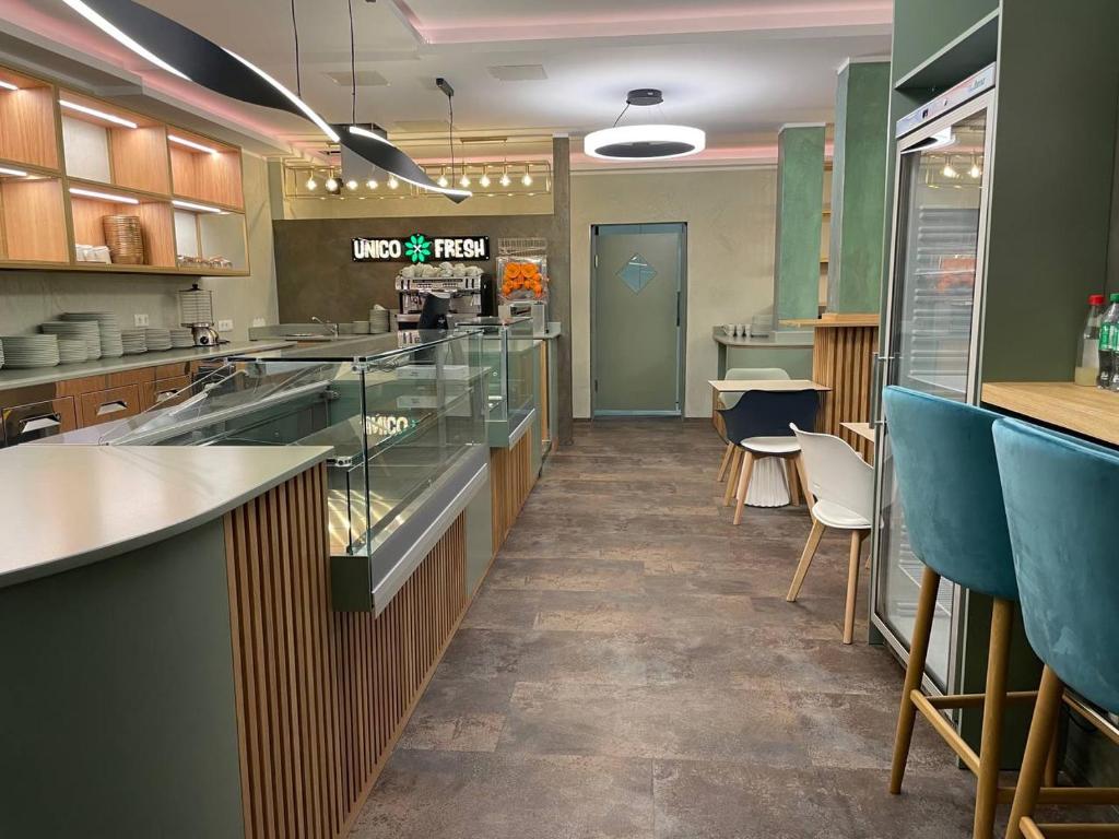 Kuchyň nebo kuchyňský kout v ubytování Design- und Kunsthotel München