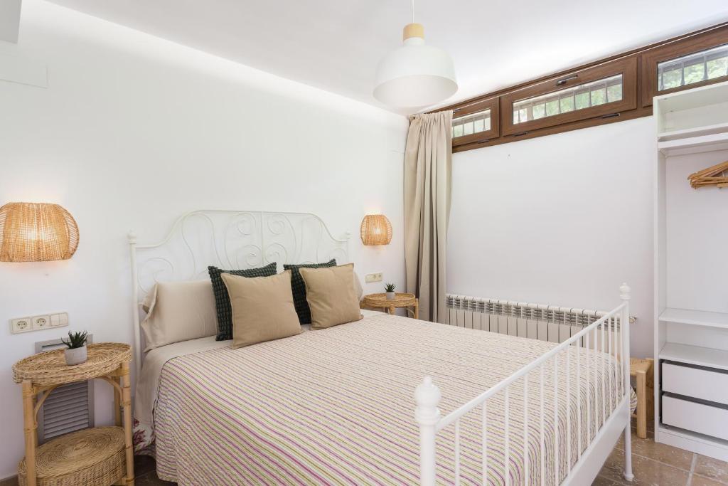 Postel nebo postele na pokoji v ubytování Resort Villa Luny Gandia