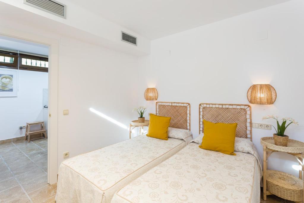 Postel nebo postele na pokoji v ubytování Resort Villa Luny Gandia