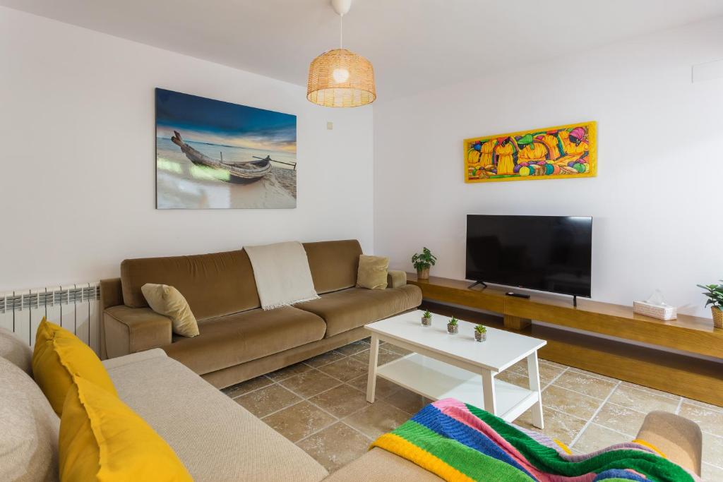 TV a/nebo společenská místnost v ubytování Resort Villa Luny Gandia