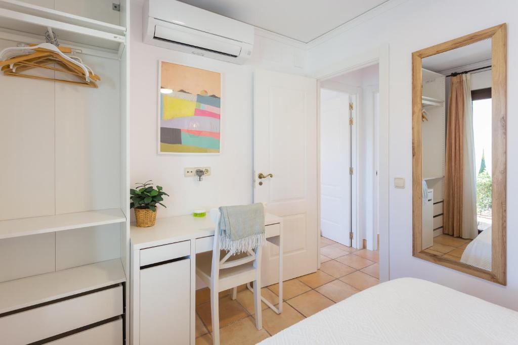 Postel nebo postele na pokoji v ubytování Resort Villa Luny Gandia