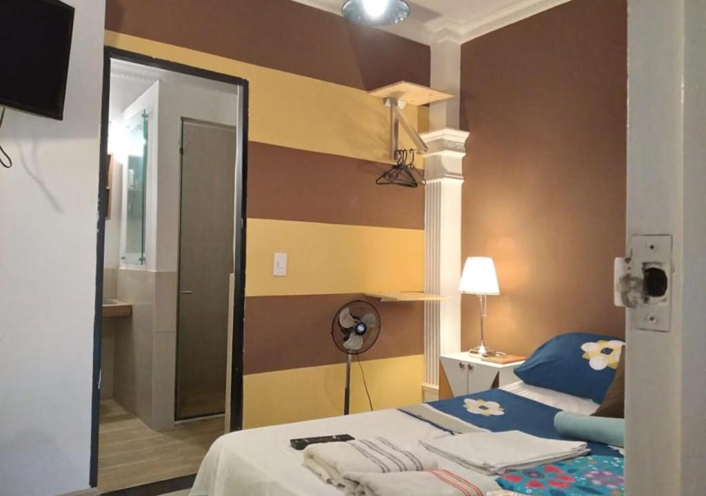 Voodi või voodid majutusasutuse Casa hotel Mi Huila toas