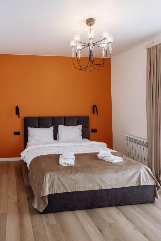 Postel nebo postele na pokoji v ubytování Arena Apart - Hotel
