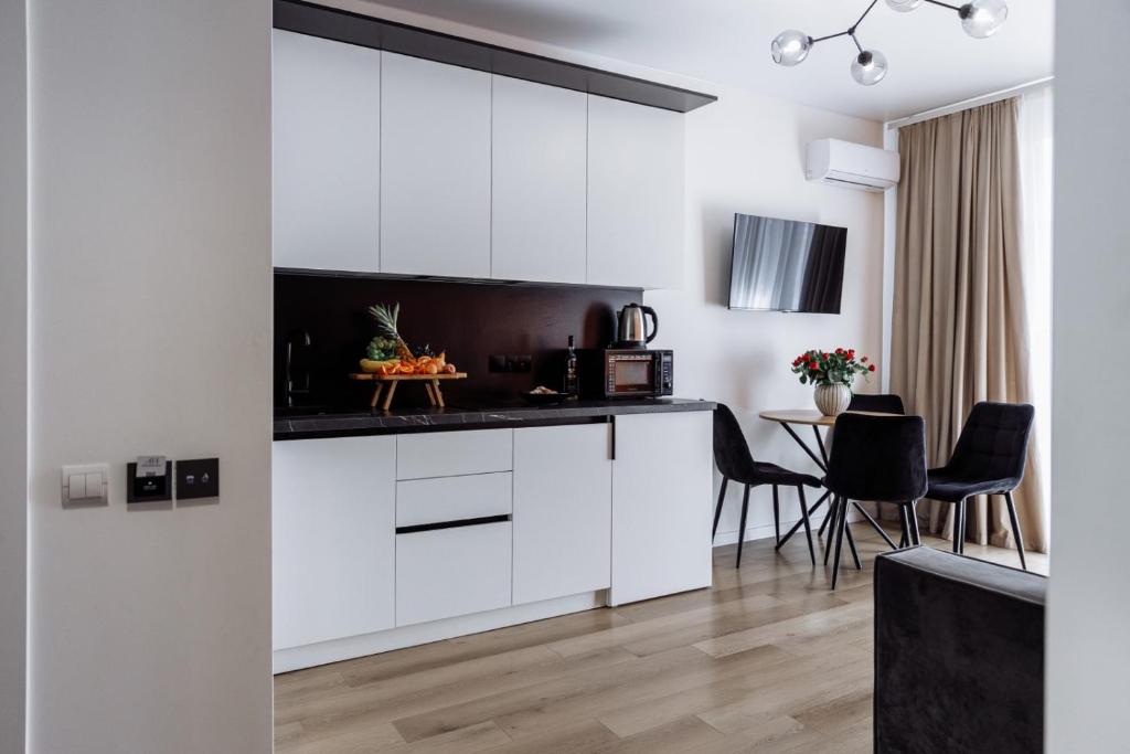 Kuchyň nebo kuchyňský kout v ubytování Arena Apart - Hotel