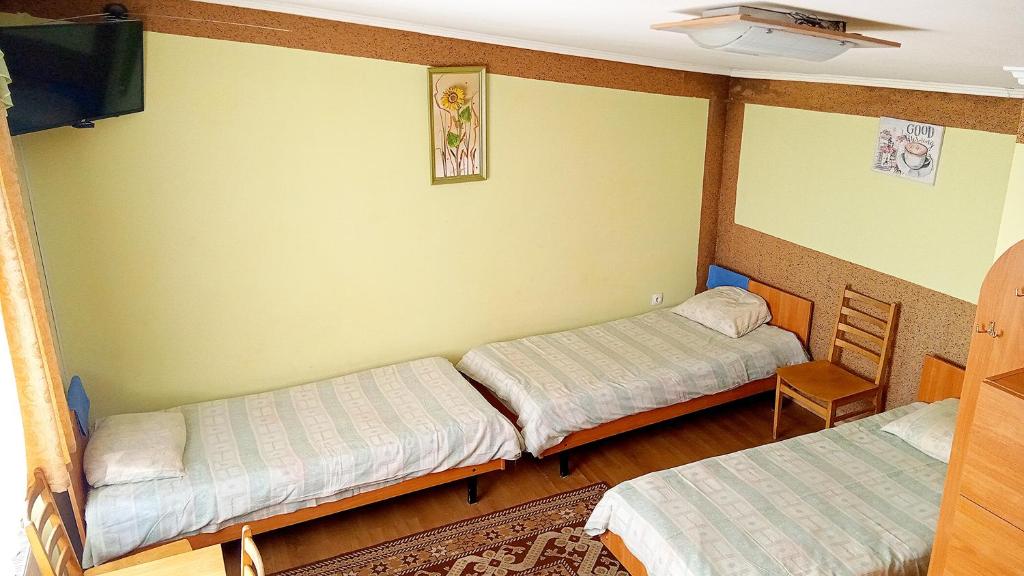 Postel nebo postele na pokoji v ubytování Coffee Hostel