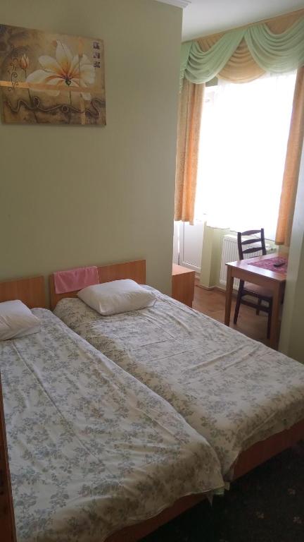 Postel nebo postele na pokoji v ubytování Coffee Hostel