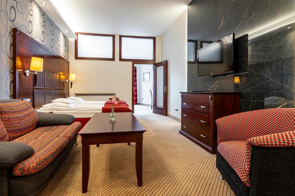 TV a/nebo společenská místnost v ubytování Hotel Galicja Superior Wellness & Spa
