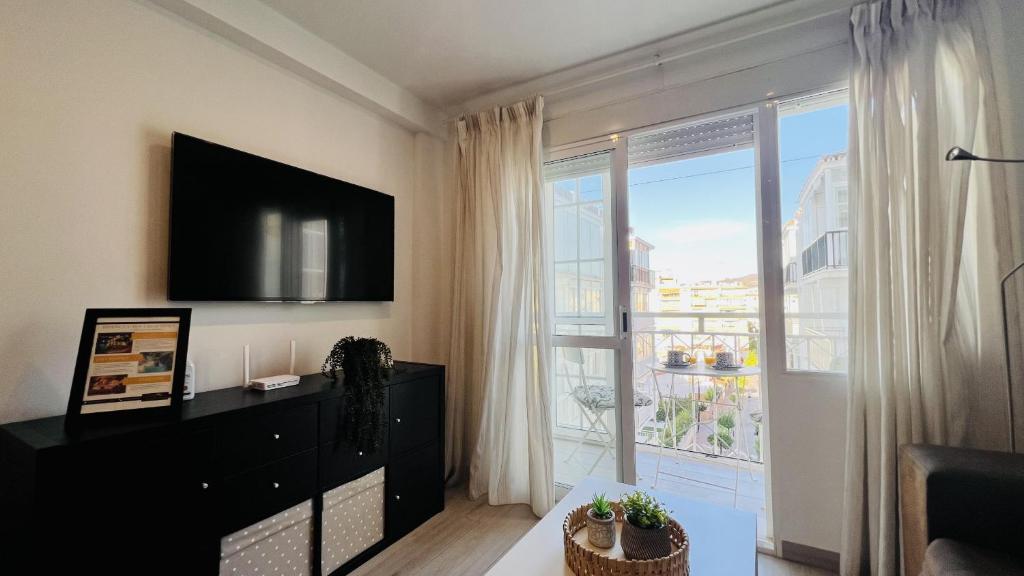 TV a/nebo společenská místnost v ubytování Apartamento Edificio Sur