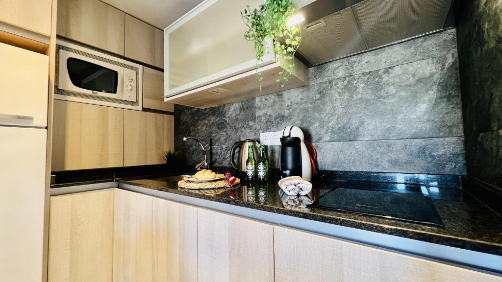 Kuchyň nebo kuchyňský kout v ubytování Apartamento Edificio Sur
