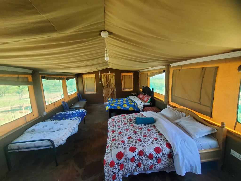 Postel nebo postele na pokoji v ubytování SEMADEP SAFARI CAMP