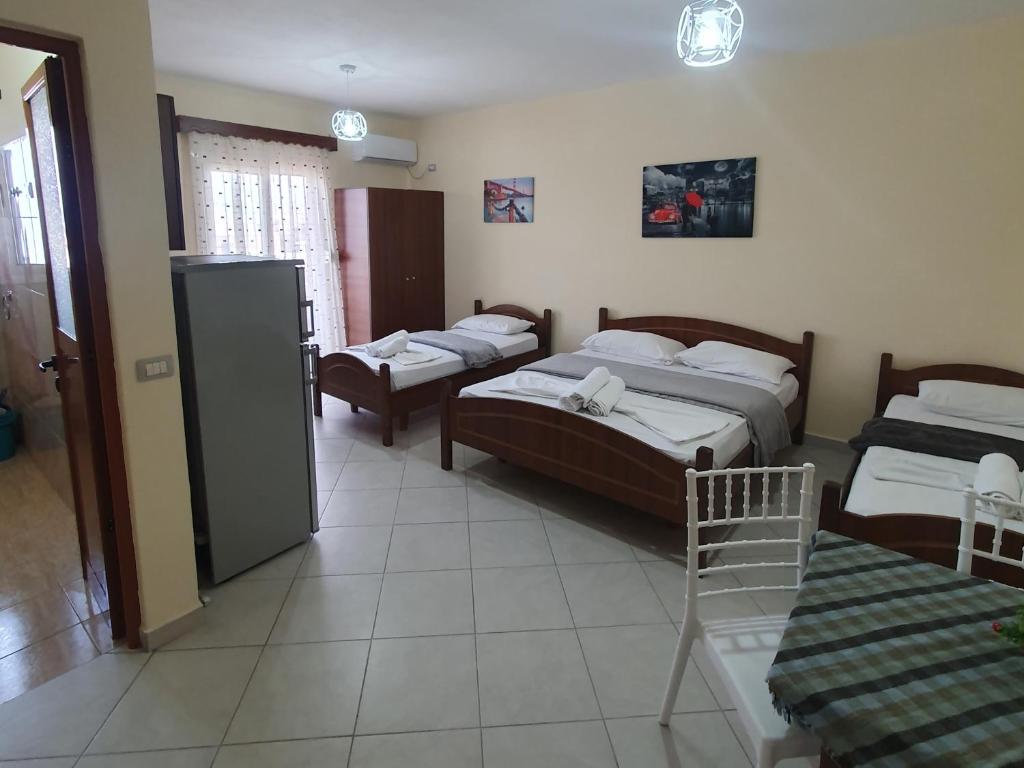 Postel nebo postele na pokoji v ubytování L&G Hotel