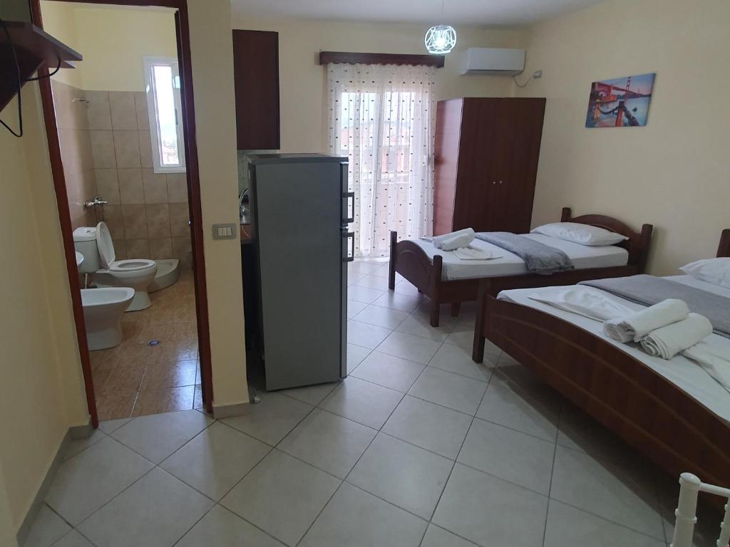 Postel nebo postele na pokoji v ubytování L&G Hotel