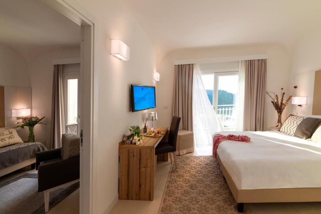 TV a/nebo společenská místnost v ubytování Hotel Moresco