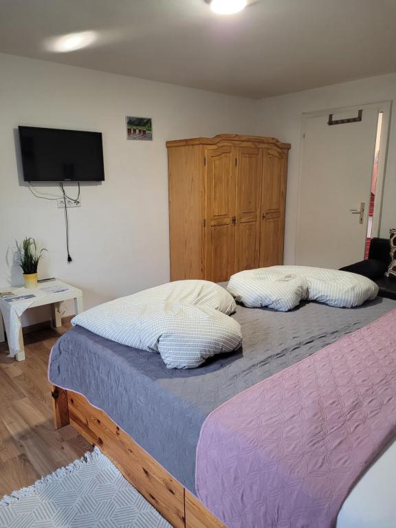 Postel nebo postele na pokoji v ubytování Ferienhaus Gertrud