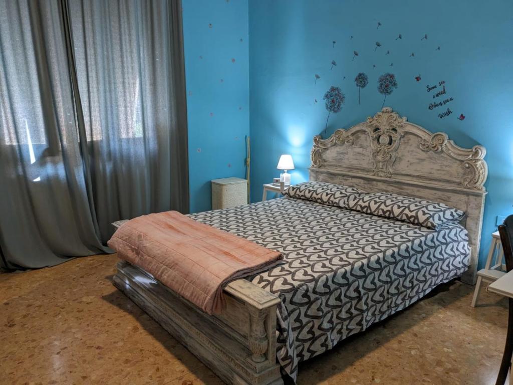 Posteľ alebo postele v izbe v ubytovaní L'ermellino Ubriaco Casa vacanza