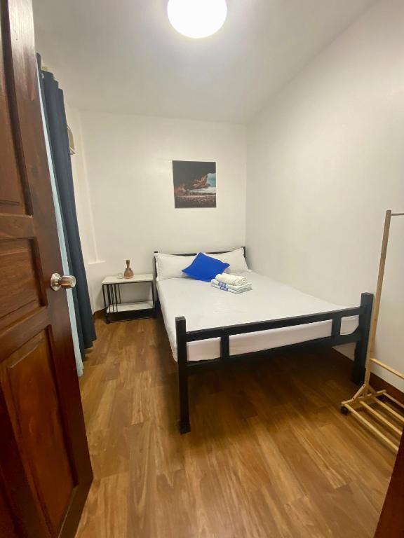 Postel nebo postele na pokoji v ubytování MyGuide Travellers Inn