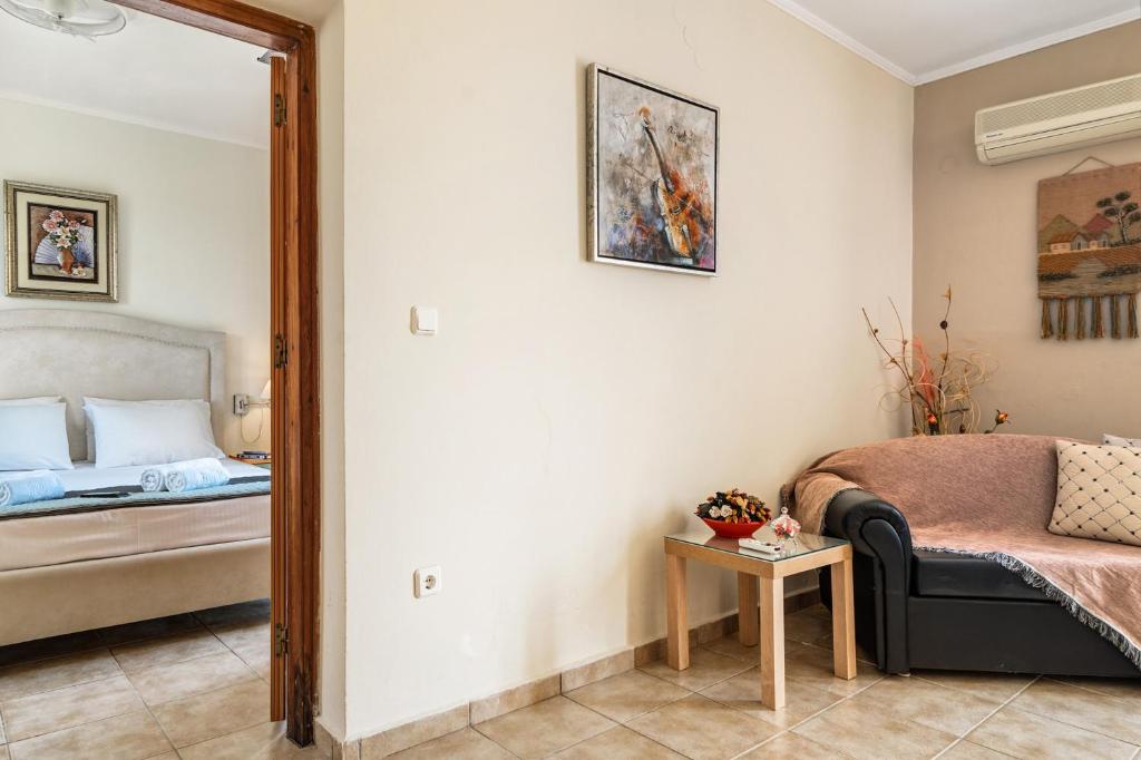 Posteľ alebo postele v izbe v ubytovaní Efrosyni apartment