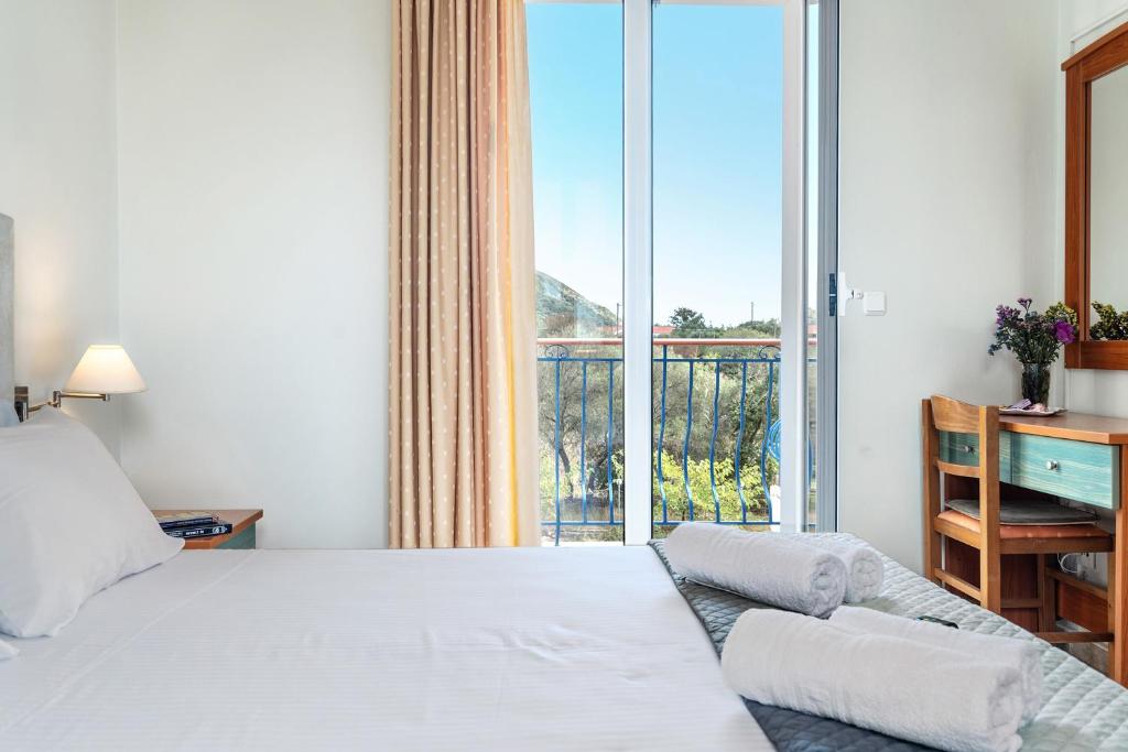 Posteľ alebo postele v izbe v ubytovaní Efrosyni apartment