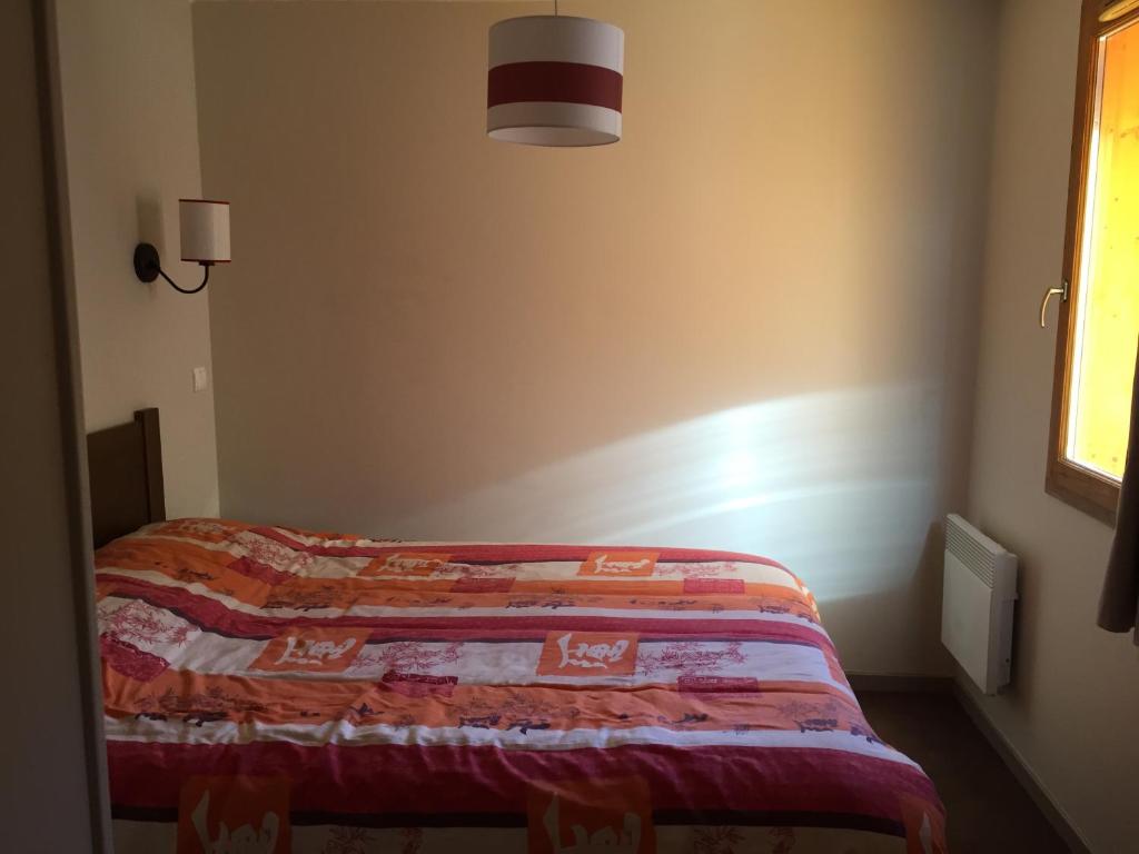 Кровать или кровати в номере Appartement Vars