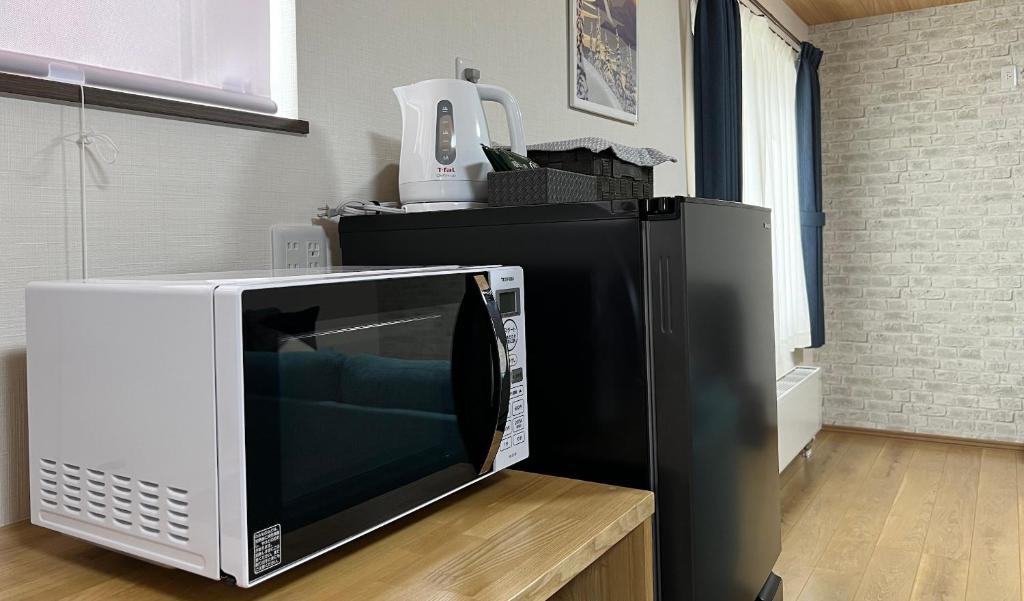 Kuchyň nebo kuchyňský kout v ubytování Furano Yukisachi House