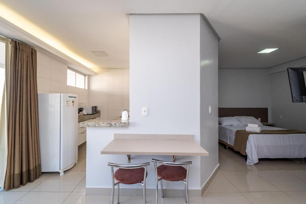 Postel nebo postele na pokoji v ubytování Onix Bueno Residence - ONX