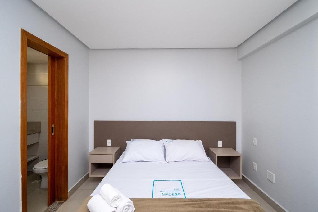 Postel nebo postele na pokoji v ubytování Onix Bueno Residence - ONX