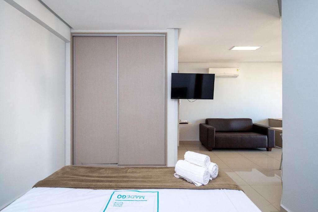 Postel nebo postele na pokoji v ubytování Onix Bueno Residence - ONX