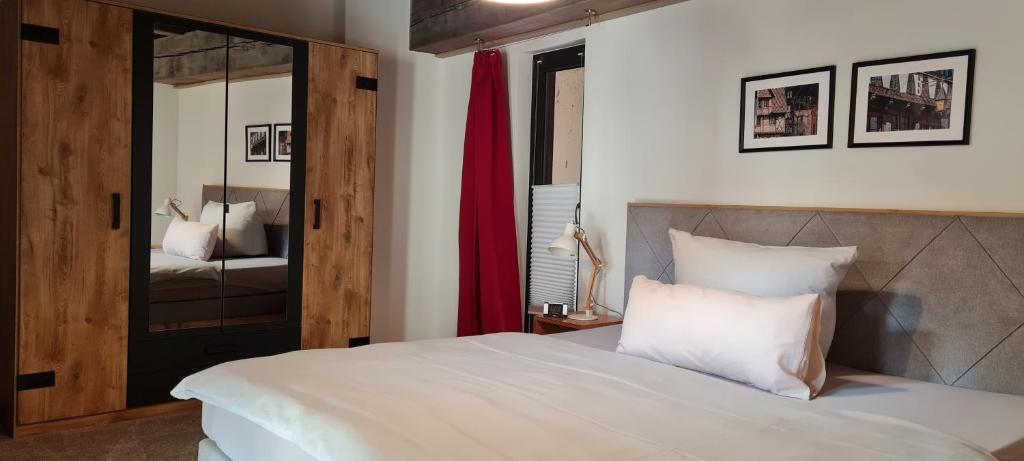 Postel nebo postele na pokoji v ubytování Ferienappartements im Speicherwerk