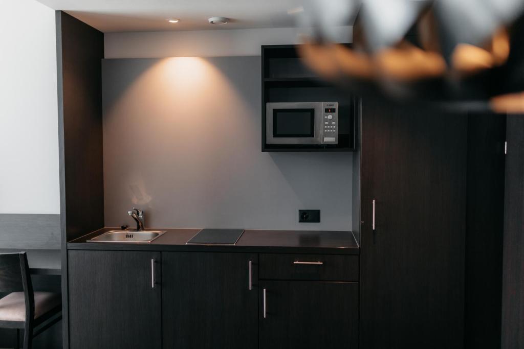 Kuchyň nebo kuchyňský kout v ubytování IIP Apartments - Self Check-In