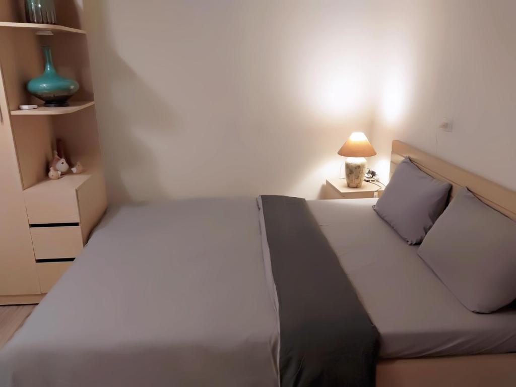 Postel nebo postele na pokoji v ubytování Da Tree Homestay