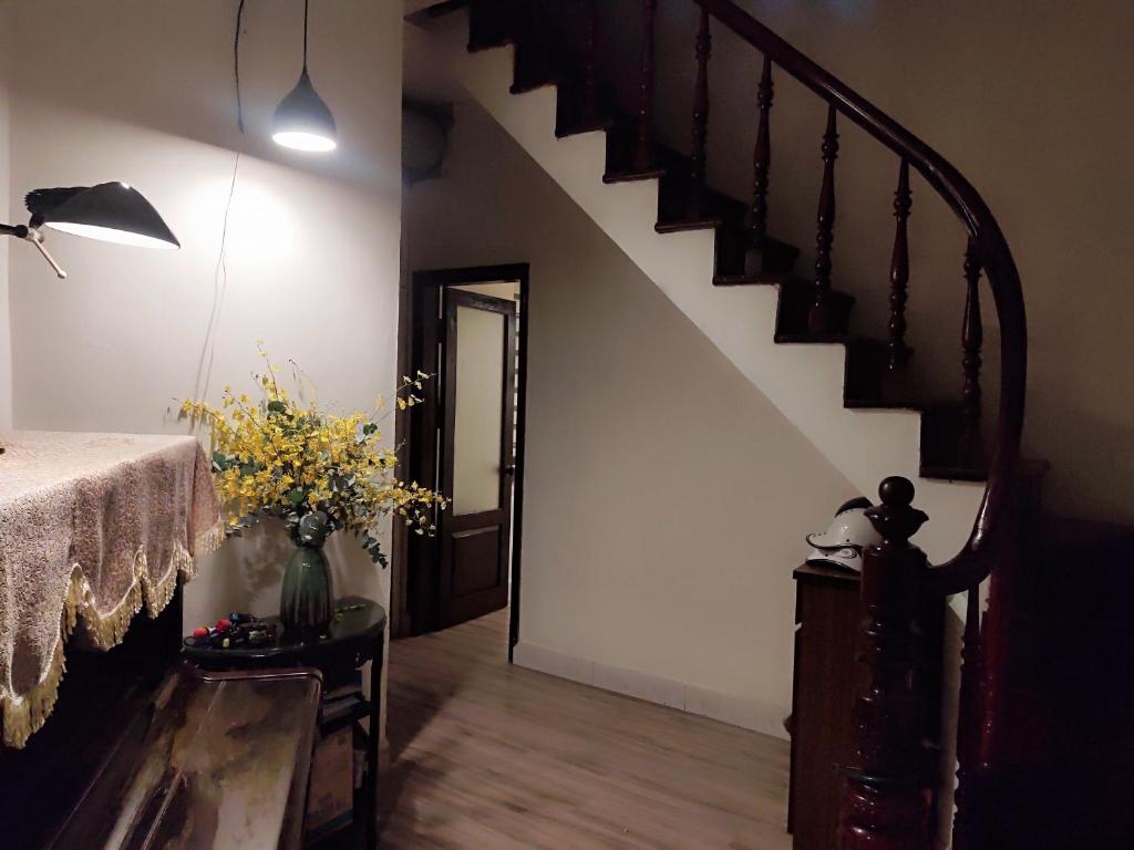 Postel nebo postele na pokoji v ubytování Da Tree Homestay