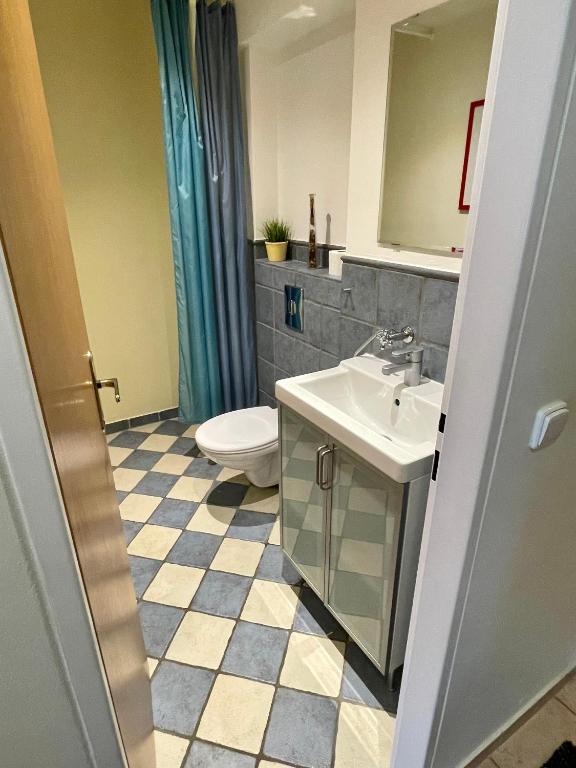Koupelna v ubytování King size apartmán Pension Monika