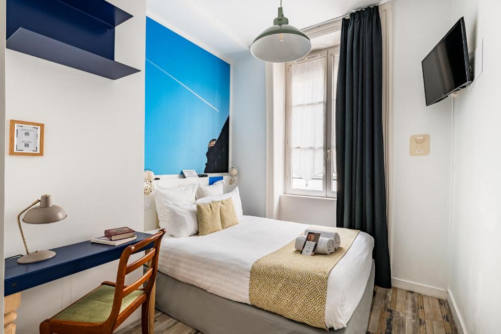 Postel nebo postele na pokoji v ubytování Hôtel du Simplon