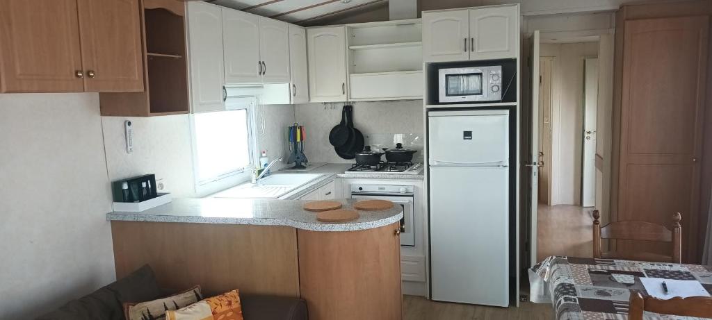 Kuchyň nebo kuchyňský kout v ubytování cottage Tangro