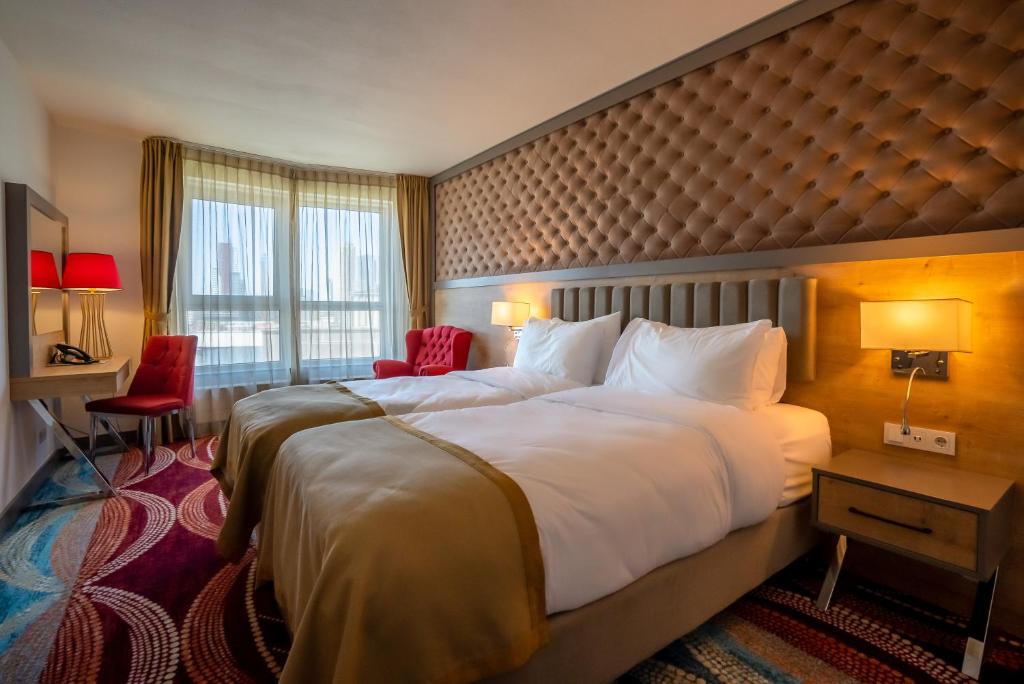 Postel nebo postele na pokoji v ubytování ART Hotel Rotterdam-Fully Renovated