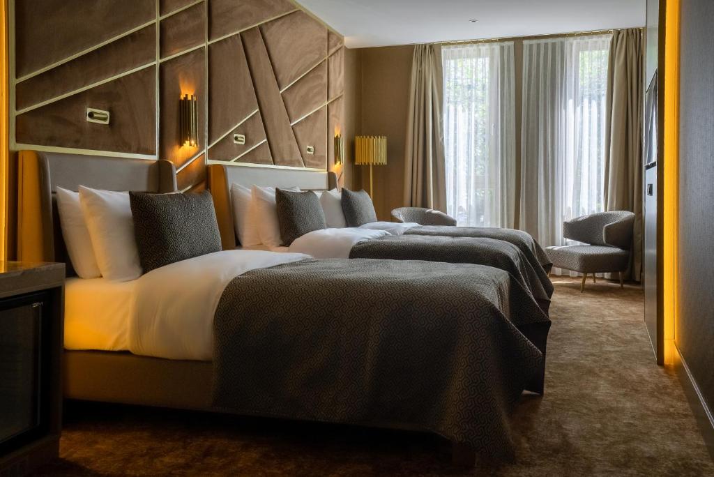 Postel nebo postele na pokoji v ubytování ART Hotel Rotterdam-Fully Renovated