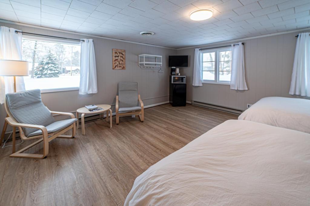 Postel nebo postele na pokoji v ubytování Star Gate Motel