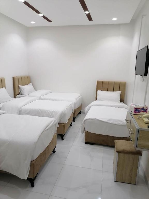 Postel nebo postele na pokoji v ubytování Mussa Spring Hotel