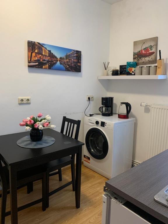 Kuchyň nebo kuchyňský kout v ubytování Praktische City Apartments direkt am Hauptbahnhof